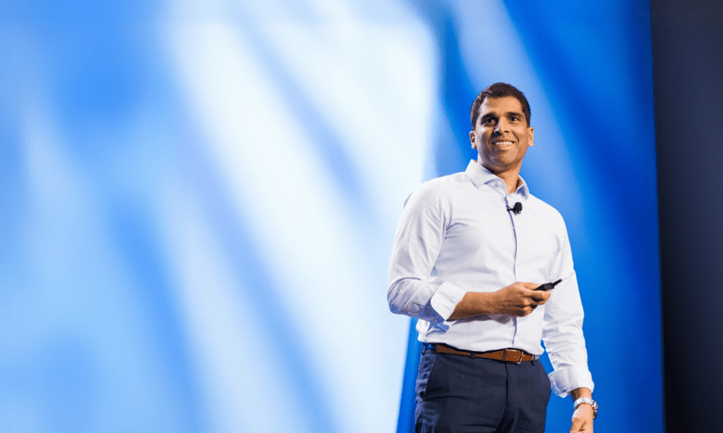 Man smiling on stage